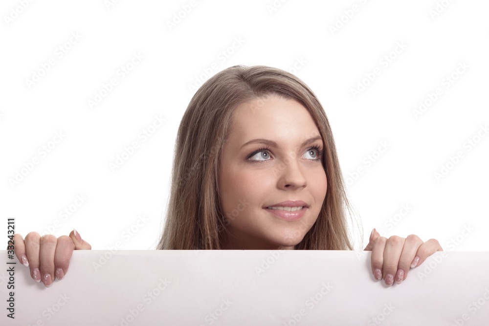 Woman looking over blank card in the studio Woman looking over blank card in the studio