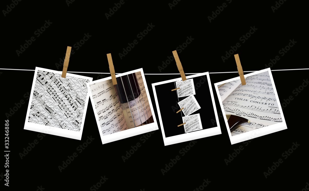 Foto Stock Polaroid musicali appese su fondo nero | Adobe Stock