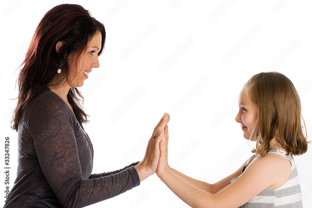 Mother and Daughter playing a game Mother and Daughter playing a game