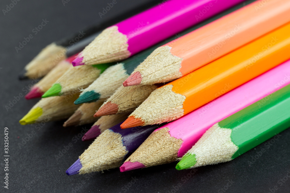 Multicolor pencils close up isolated on black Multicolor pencils close up isolated on black