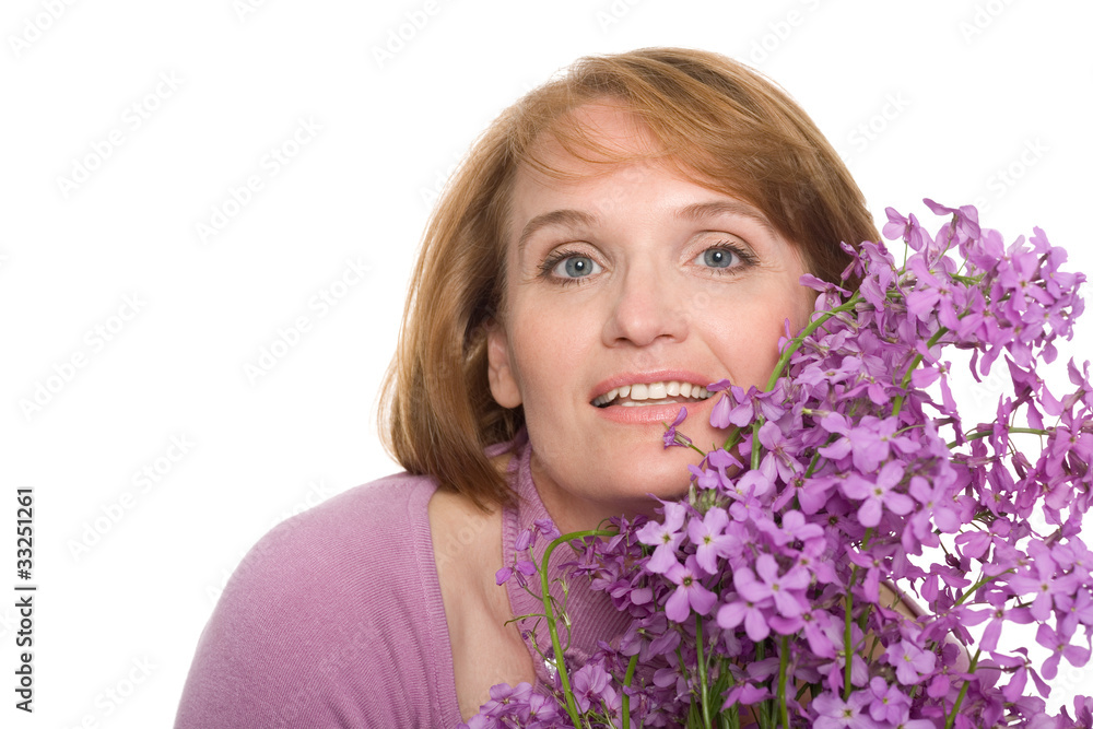 Smiling woman with wildflowers Smiling woman with wildflowers