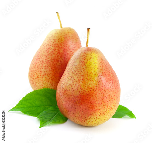 Two red pears with leaves. Isolated on white background.