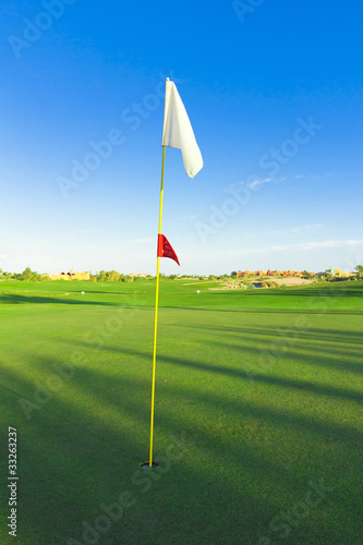 Golf Flag Stirred By The Wind