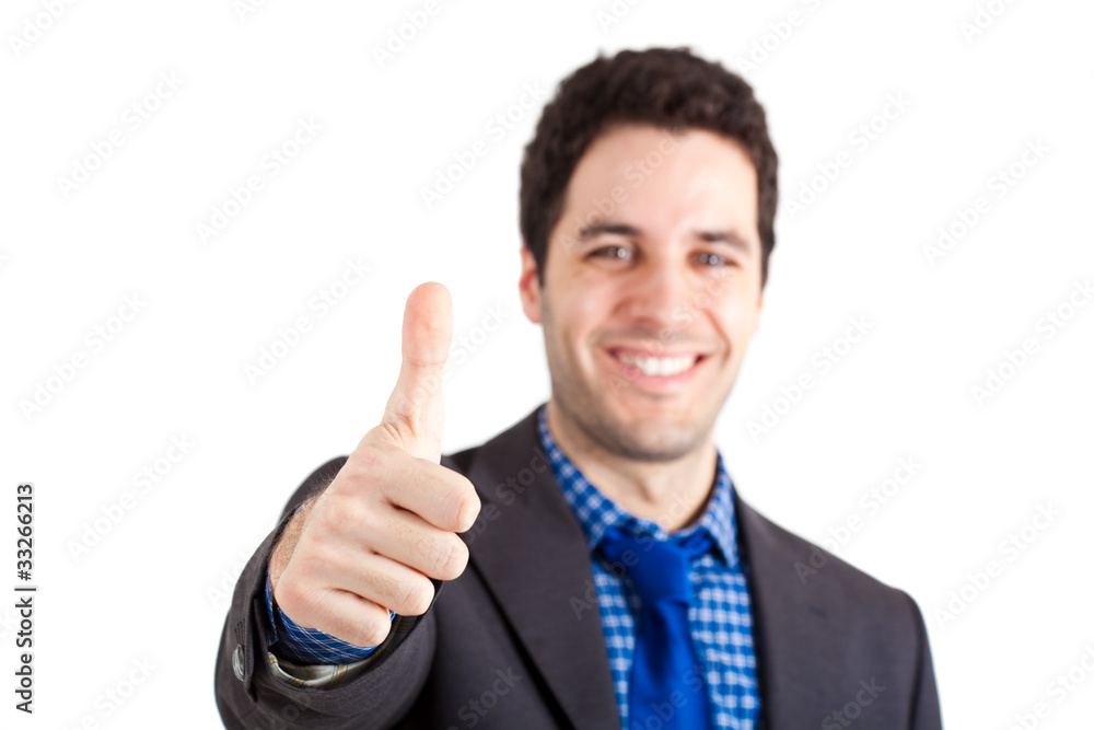 Young businessman showinh ok gesture Young businessman showinh ok gesture