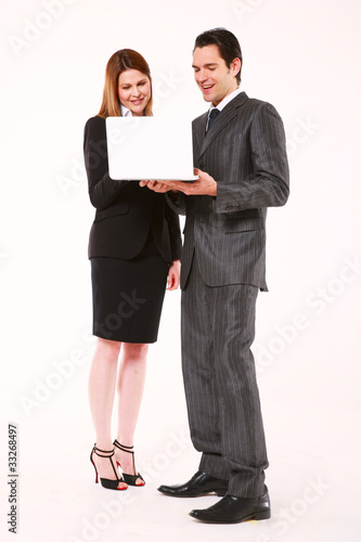 businessman and businesswoman with laptop