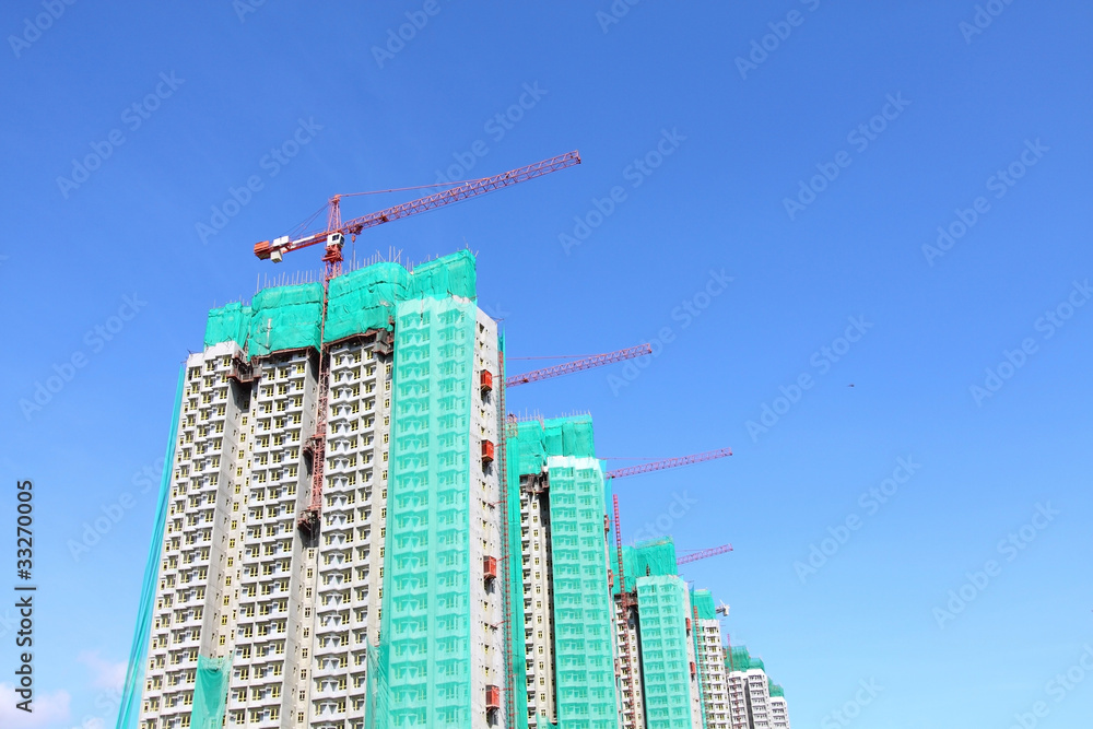 Construction site with crane and building Construction site with crane and building