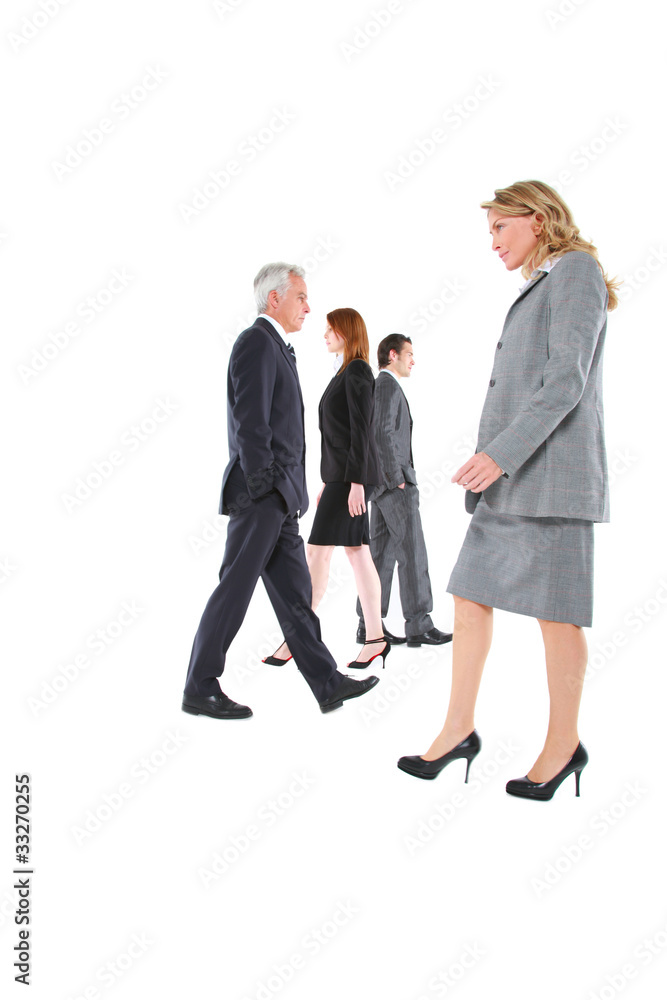 businessman and businesswoman walking in different directions businessman and businesswoman walking in different directions