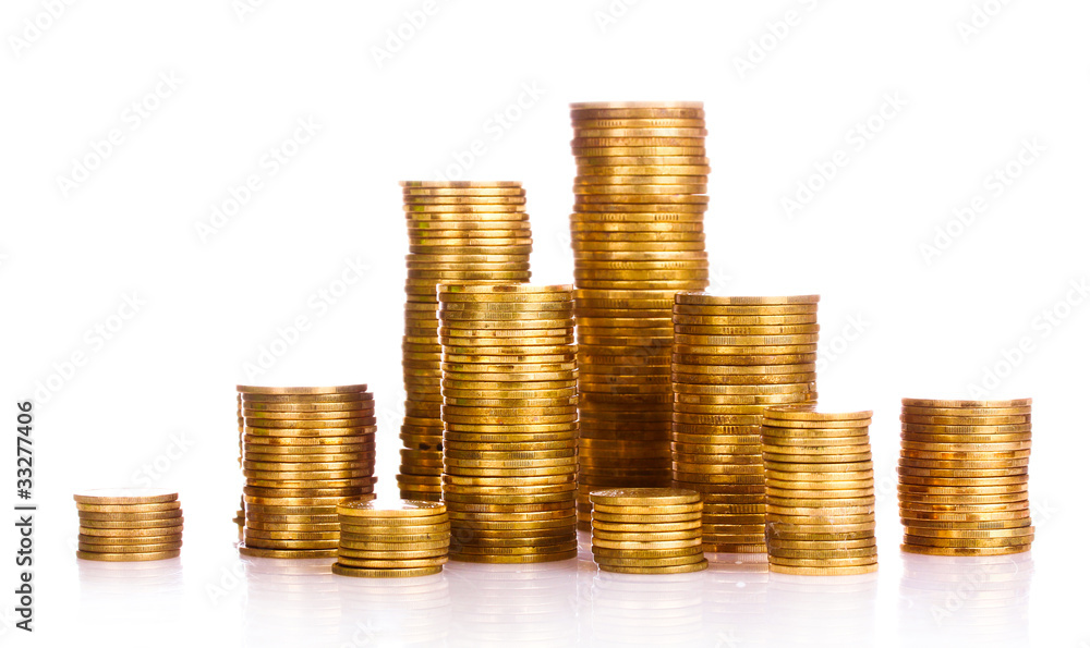 Many coins in column isolated on white Many coins in column isolated on white