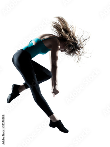 Energetic female doing aerobics