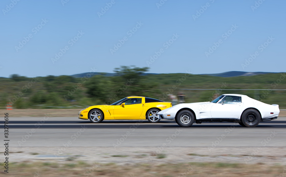 Race between two sportcars in a straight line