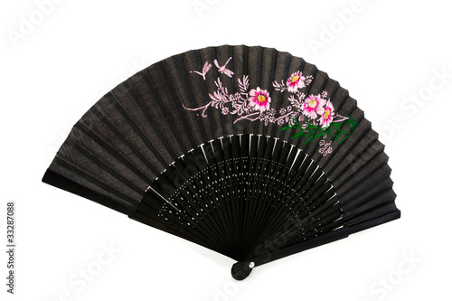 Black chinese hand fan over white