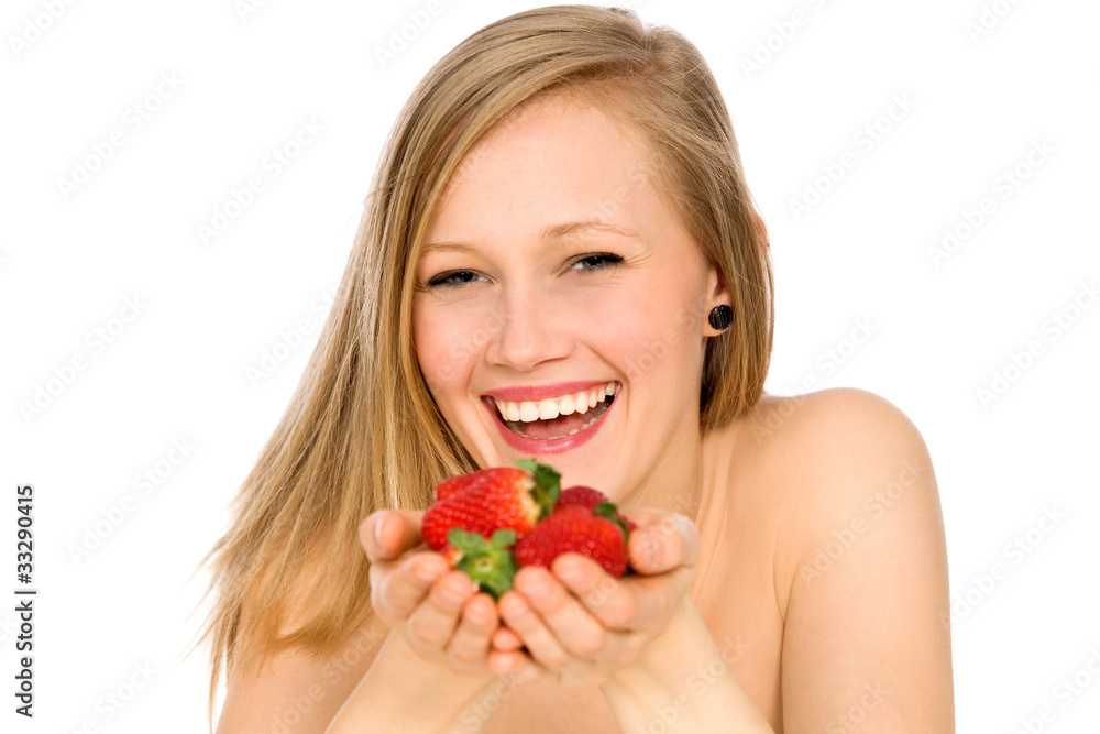 Young woman holding strawberries in her hands Young woman holding strawberries in her hands