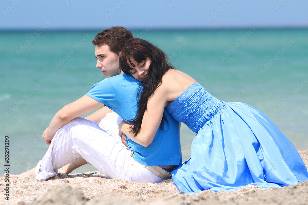 young loving couple on beach