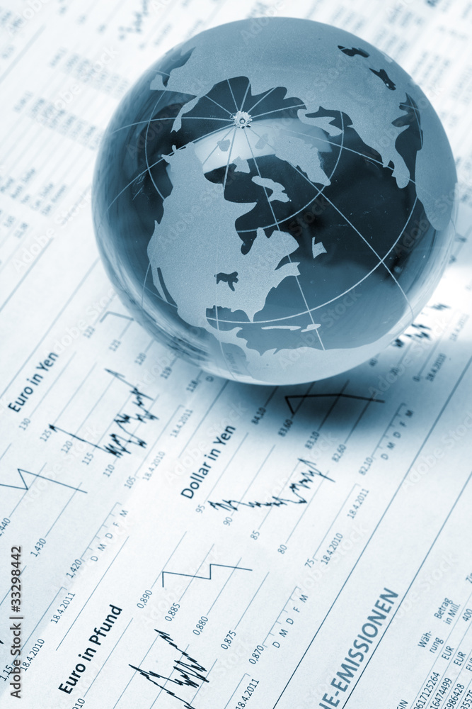 Globe on business documents Globe on business documents