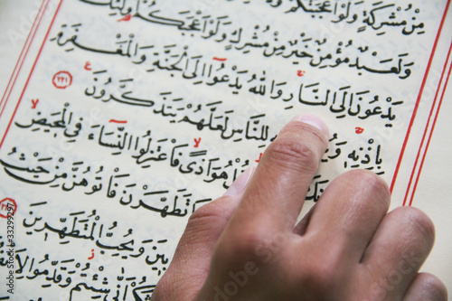 student reading the Koran