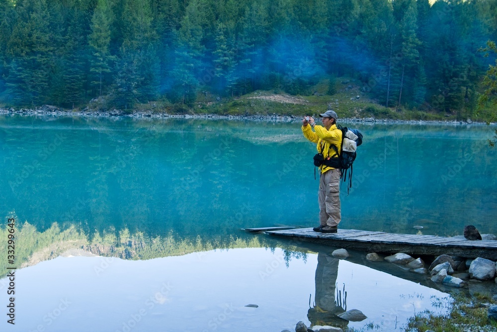 photographer on a lake