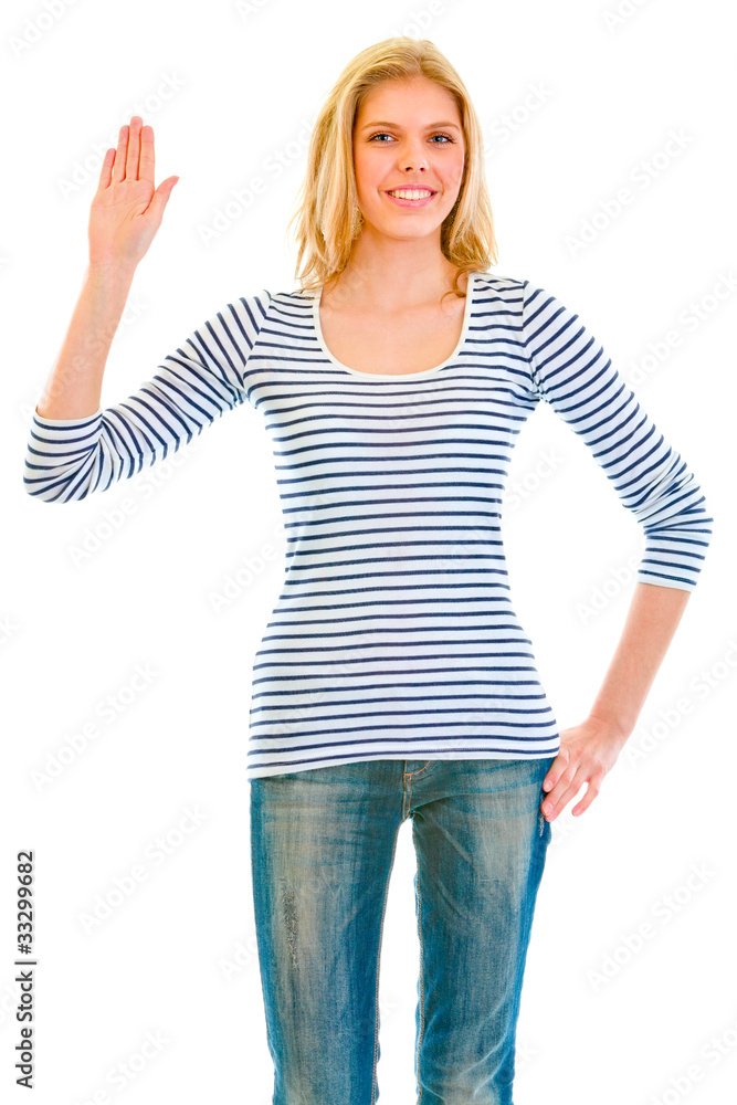 Smiling beautiful teengirl showing salutation isolated on white. Smiling beautiful teengirl showing salutation isolated on white.