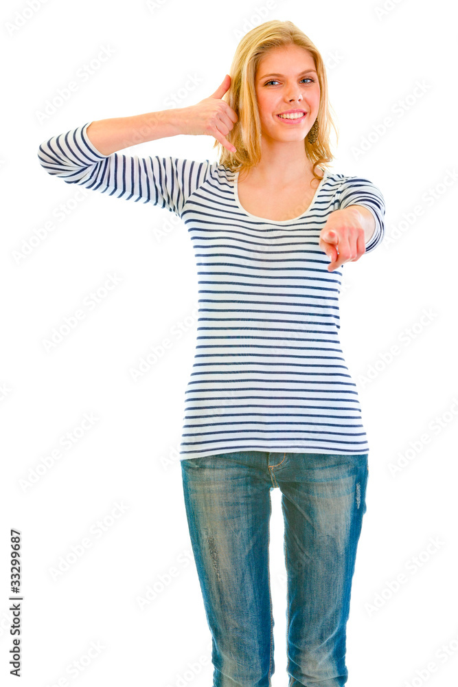 Smiling teengirl showing contact me and pointing at you Smiling teengirl showing contact me and pointing at you