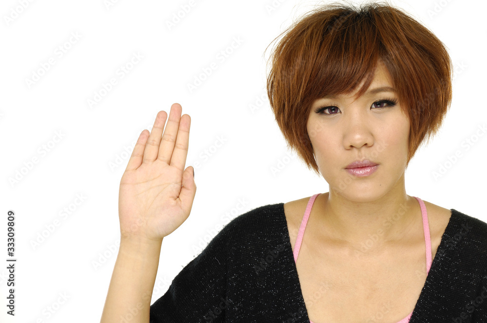 Close up of young woman's hand in stop gesture Close up of young woman's hand in stop gesture
