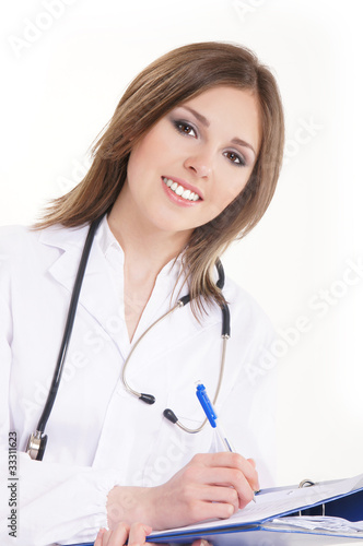 Portrait of a female doctor in white clothes with a stethoscope
