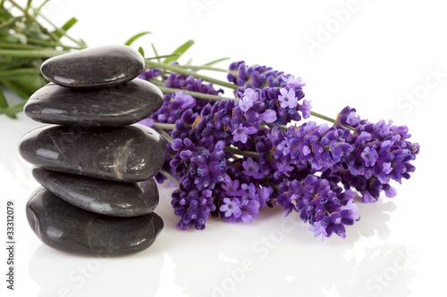 stacked black steping stones and lavender flowers