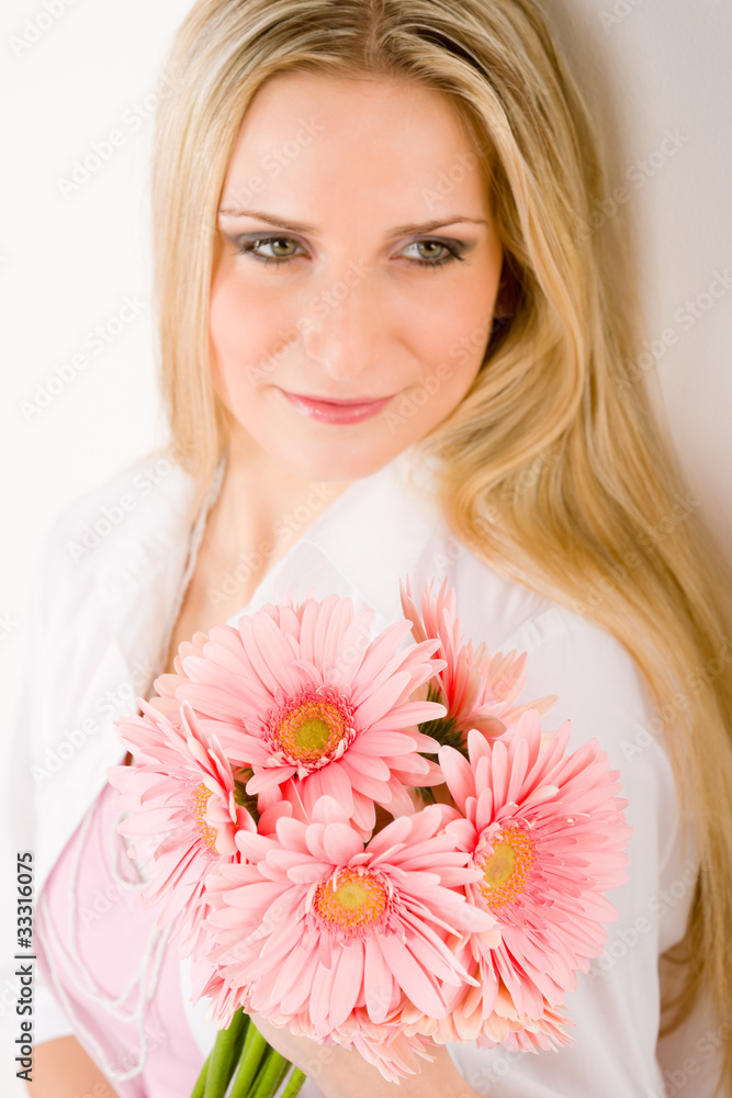 Romantic woman hold pink gerbera daisy Romantic woman hold pink gerbera daisy