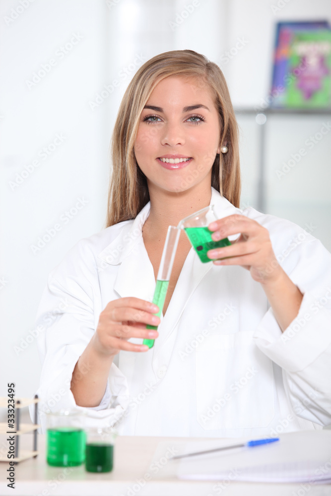 Science student with test tube and beaker Science student with test tube and beaker