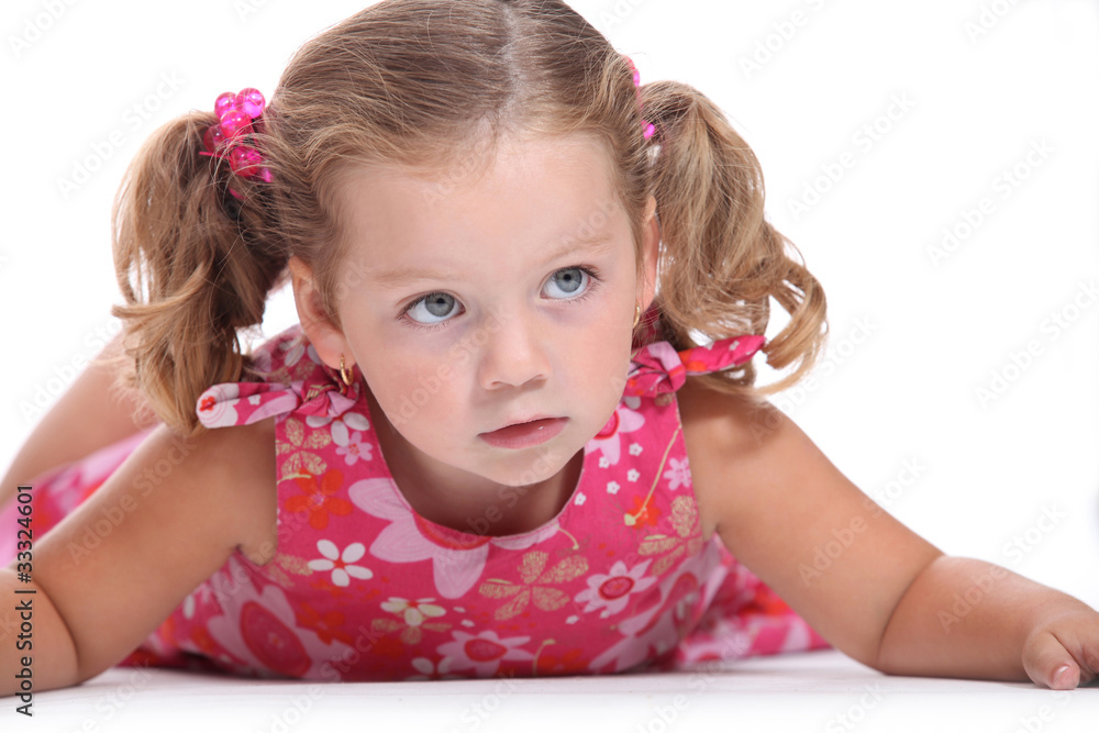 Little girl wearing pink floral dress Little girl wearing pink floral dress