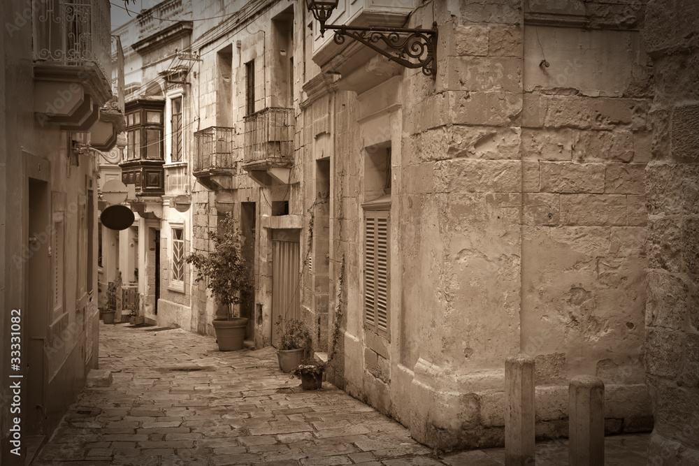 Retro photo of old narrow  street - obrazy, fototapety, plakaty 