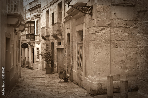 Retro photo of old narrow  street