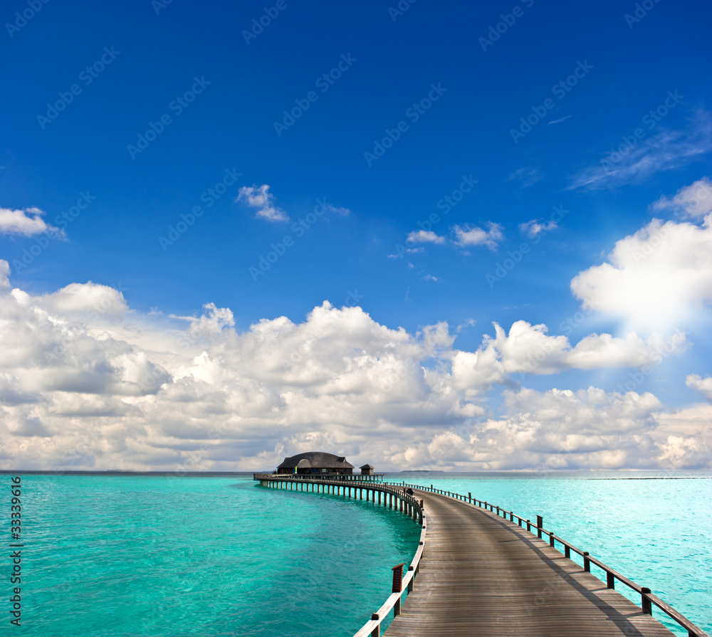 tropical seascape. overwater bungalow