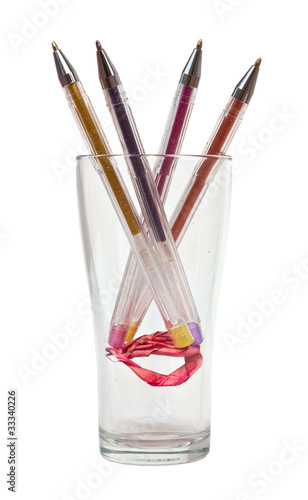 Multi-color pen set in a glass. © kaentian