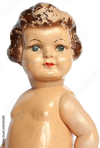 Headshot of an old vintage doll