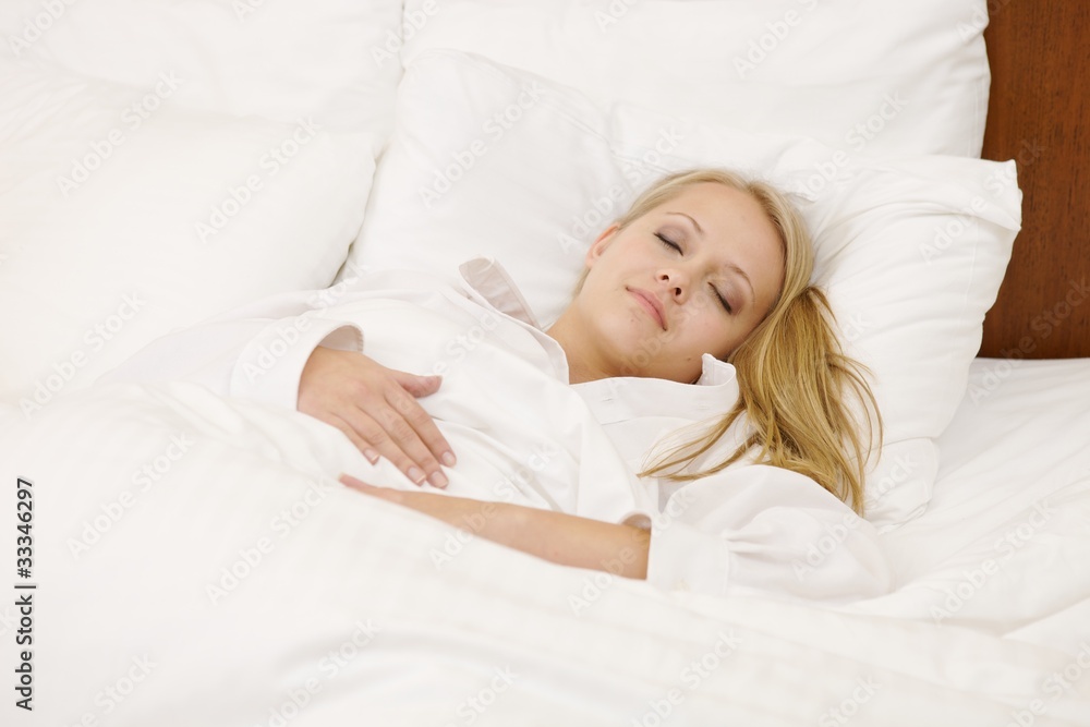Peaceful Woman Lying in Bed Resting at Home Peaceful Woman Lying in Bed Resting at Home