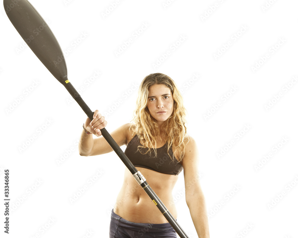 young athlete girl holding a conae paddle young athlete girl holding a conae paddle
