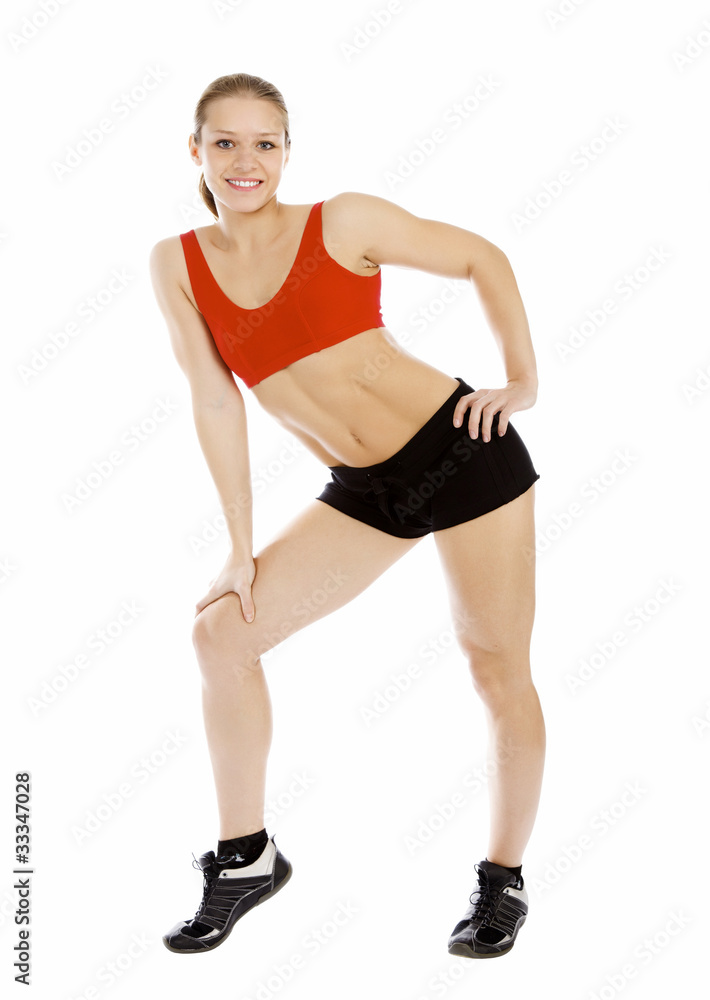 Smiling young sporty muscular woman. Smiling young sporty muscular woman.