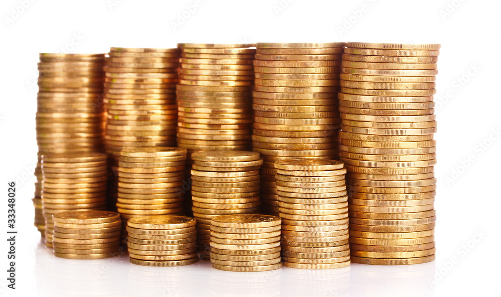 Many coins in column isolated on white Many coins in column isolated on white