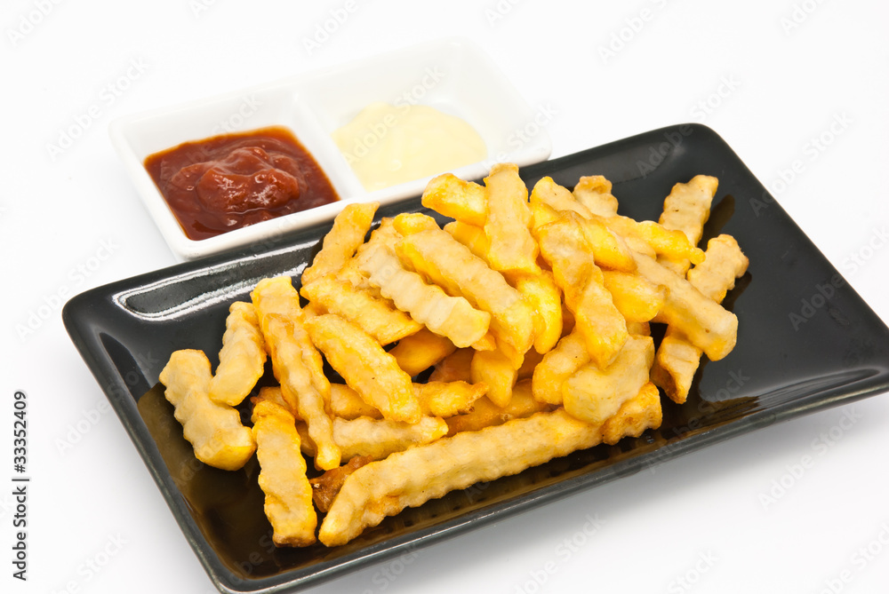 French fries in black plate French fries in black plate