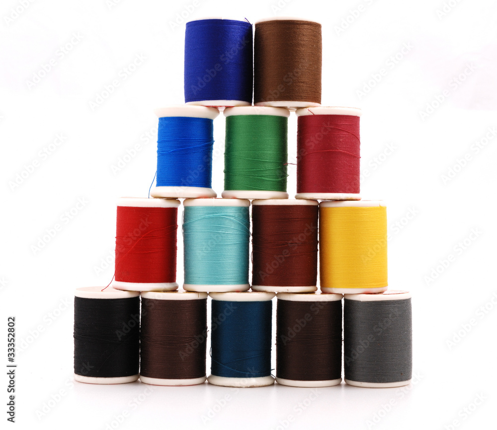 Spools of colour threads isolated on white Spools of colour threads isolated on white