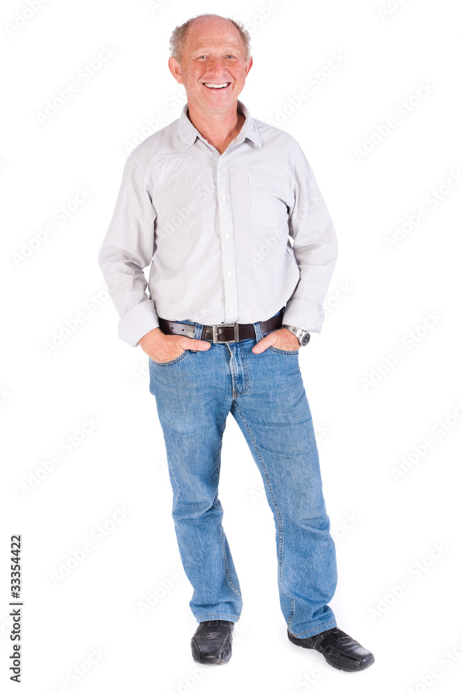 Studio portrait of smiling senior man