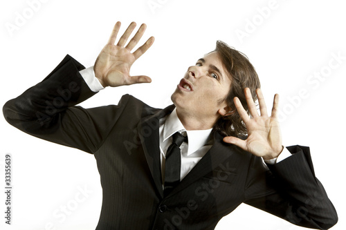 Fotografie young businessman crushed on a glass