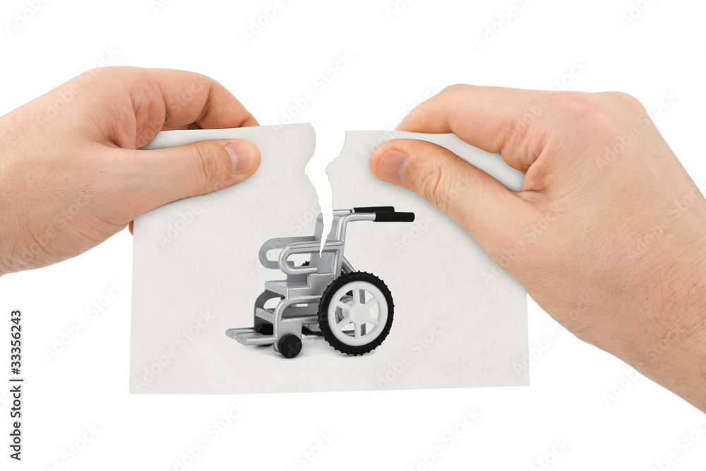 Hands tear picture with wheelchair Hands tear picture with wheelchair