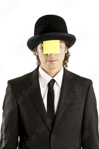 man with blank note on the face with hat