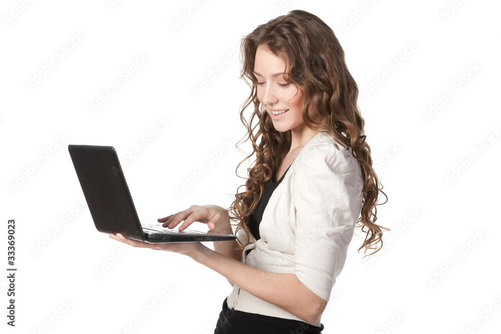 Young female working on laptop isolated on white background Young female working on laptop isolated on white background