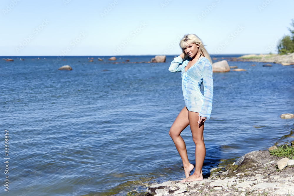 girl is enjoying summer on the beach