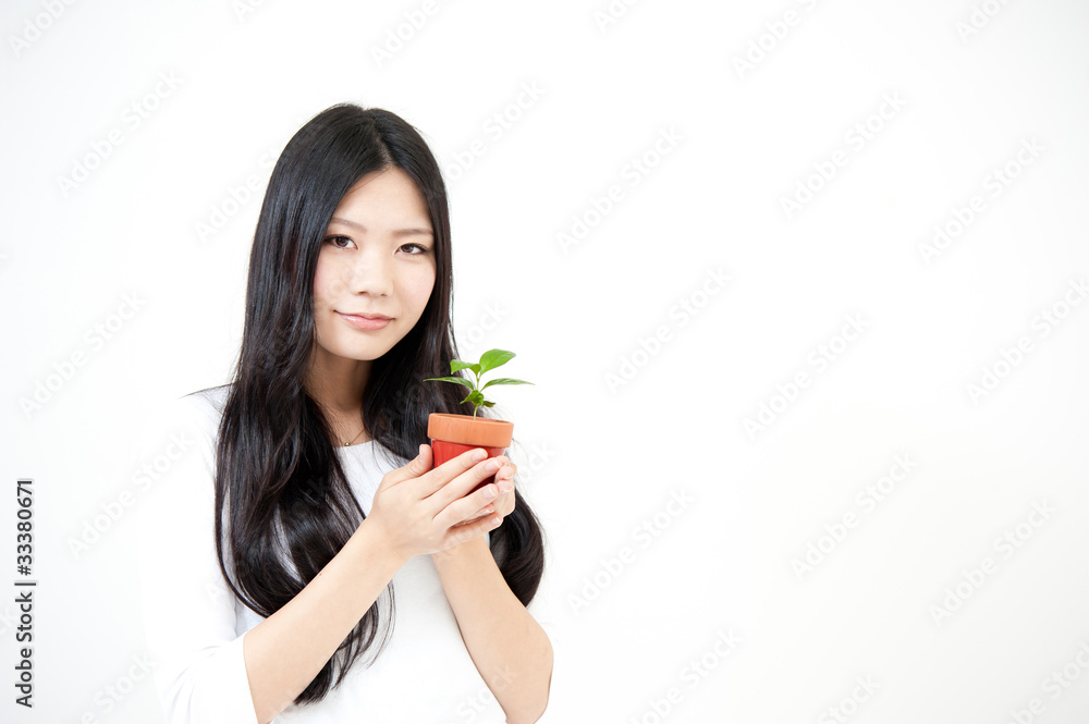 beautiful asian woman with small plant beautiful asian woman with small plant