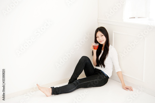 beautiful asian woman rlaxing in the room