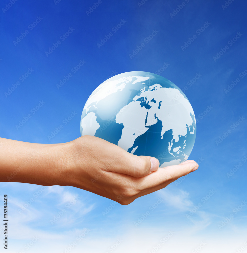 holding a glowing earth globe in his hands holding a glowing earth globe in his hands