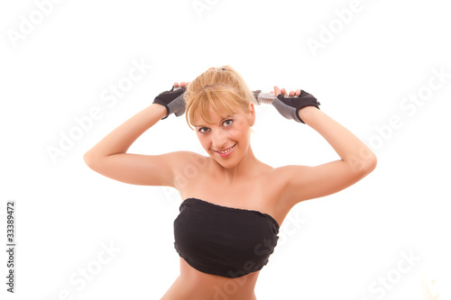 young healthy women exercising with free weights