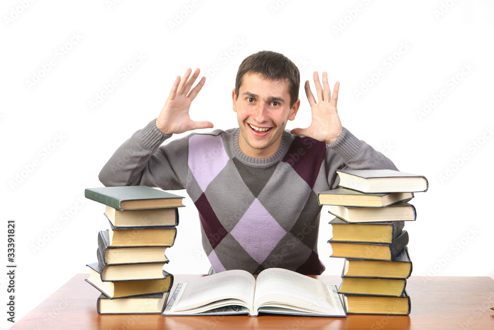 the guy is sitting among the books the guy is sitting among the books